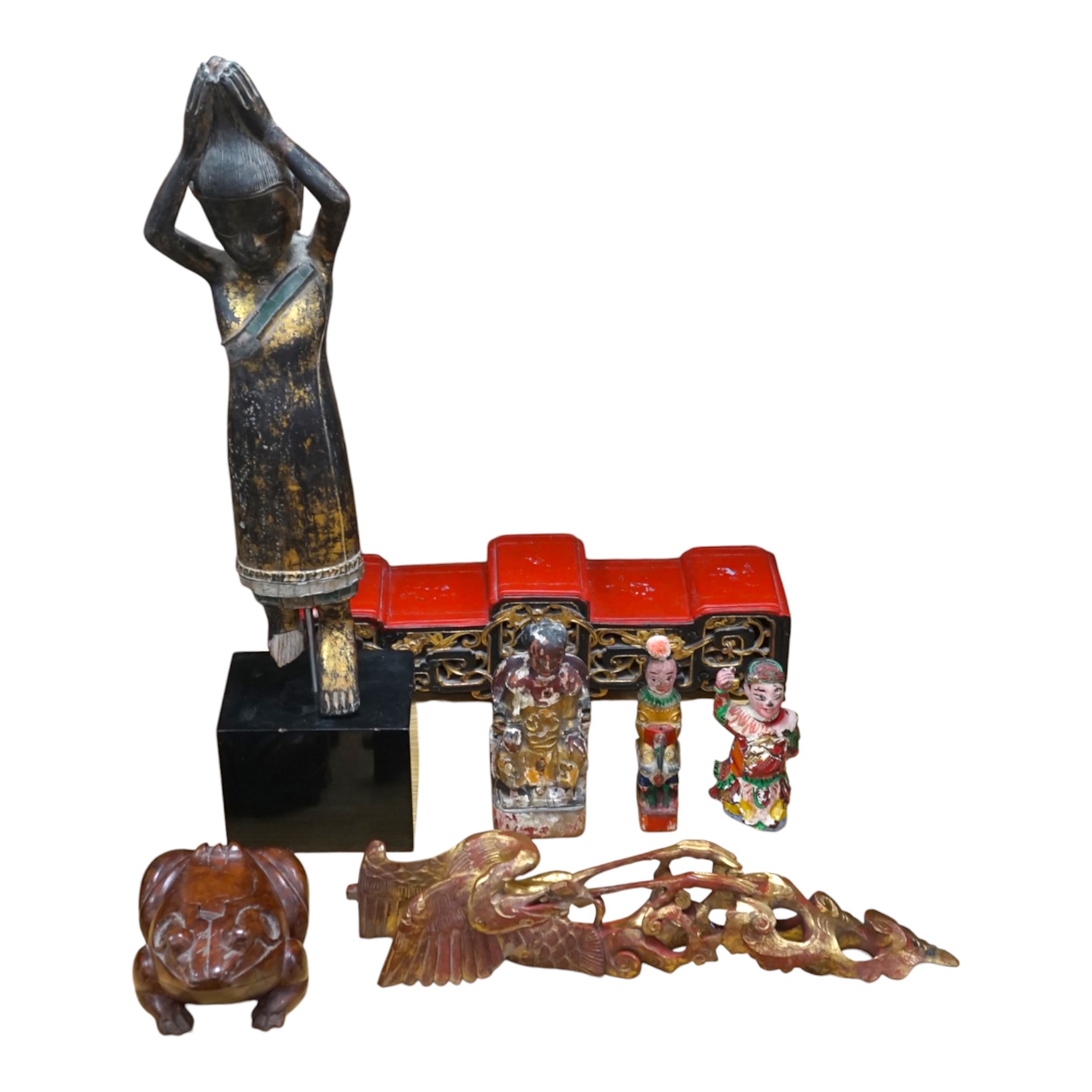 A carved painted South East Asian figure on stand, lacquered wood figures and carvings and a carved frog box, painted figure 50cm high. Condition - mixed, poor to fair